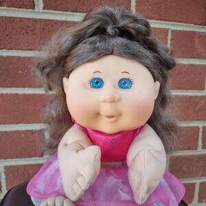 Cabbage Patch Kid, pink dress, brown hair, blue eyes